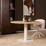 Eiken Eettafel Ferris Rond 110 cm ronde eettafel - zwart en naturel - Mooier Thuis