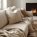 Kussens en plaids combineren: zo maak je je bank (of bed) direct warmer en stijlvoller