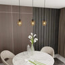 ISTAR 1-lichts hanglamp - Amber glas hanglamp met ronde bol - sfeervol in een Modern interieur
