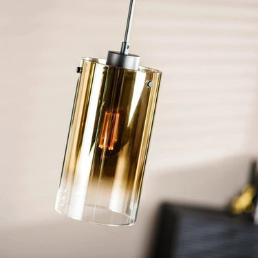 3-flammige Pendelleuchte mit goldfarbenem Glas