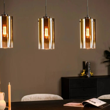 4-flammige Pendelleuchte mit warmgoldenem Glas