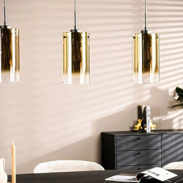 4-flammige Pendelleuchte mit warmgoldenem Glas