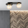 PLAZA 2-lichts plafondlamp - Amber glas - Zwart frame plafondlamp met ronde bol - sfeervol in een Modern interieur