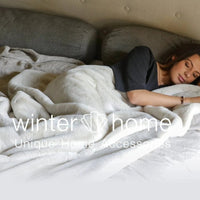 Winterhome luxe imitatiebont deken Guanaco Butter