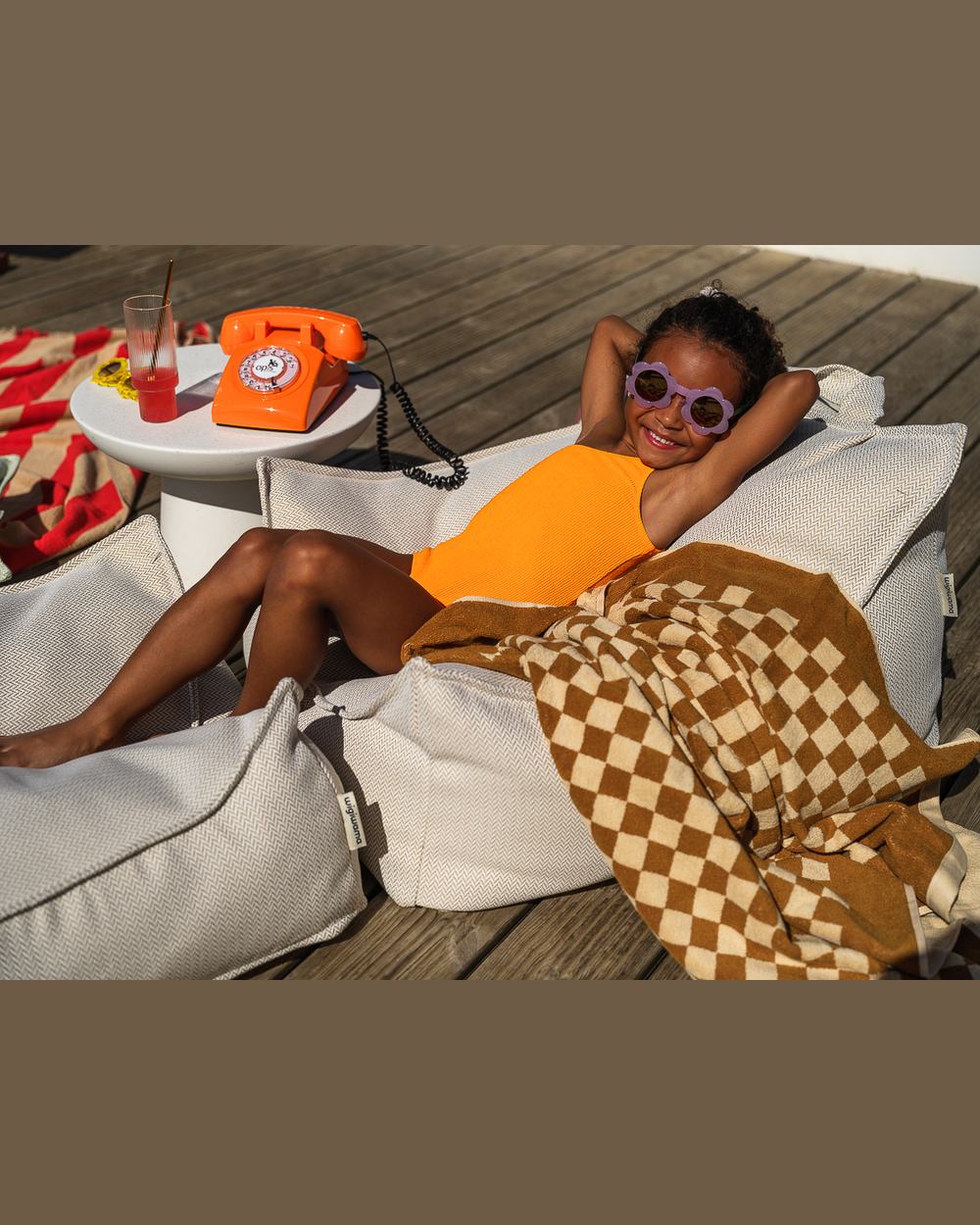 Wigiwama Square Outdoor-Pouf Terra in een kinderkamer